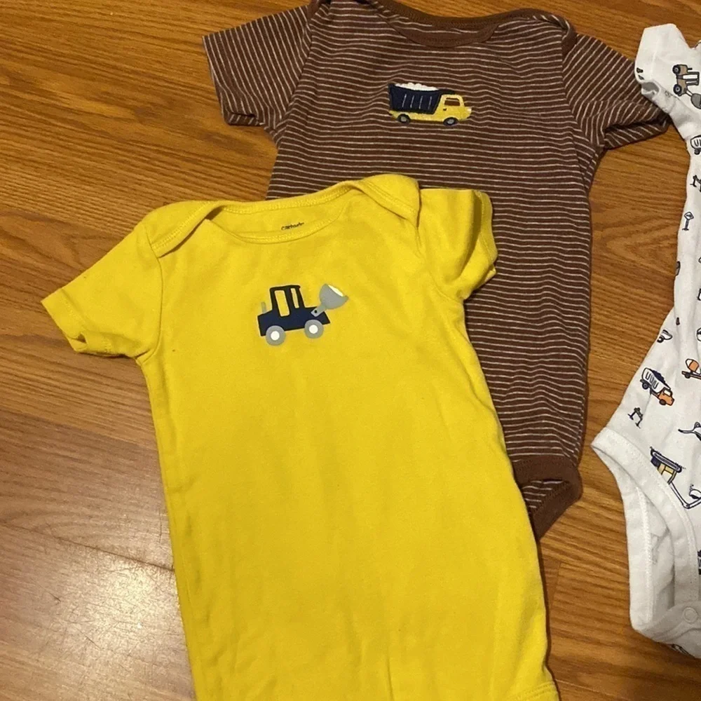 Set of 4 Carter’s One Piece size 24 months (CA)